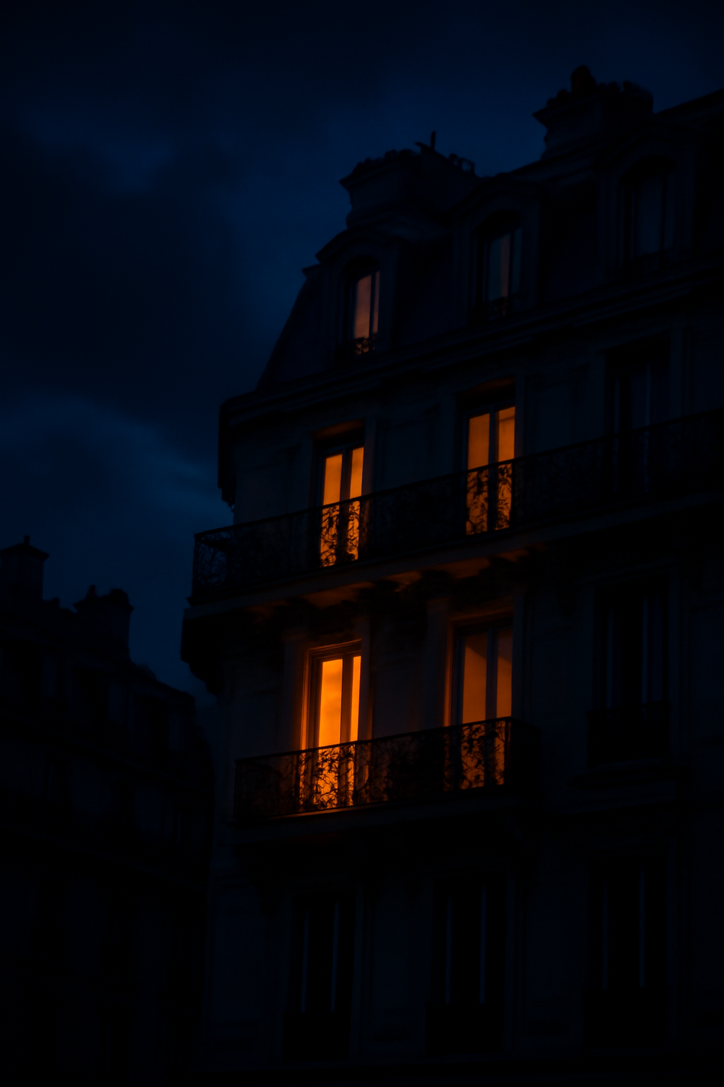 Parisian balcony at night